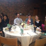 Guests seated around a table